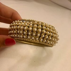 Gold and pearl bangle